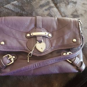 Juicy purple leather clutch